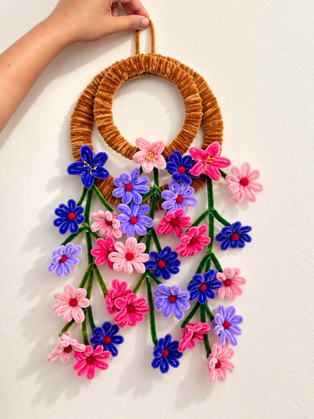 Cascading flower wall hanging — handcrafted flower arrangement